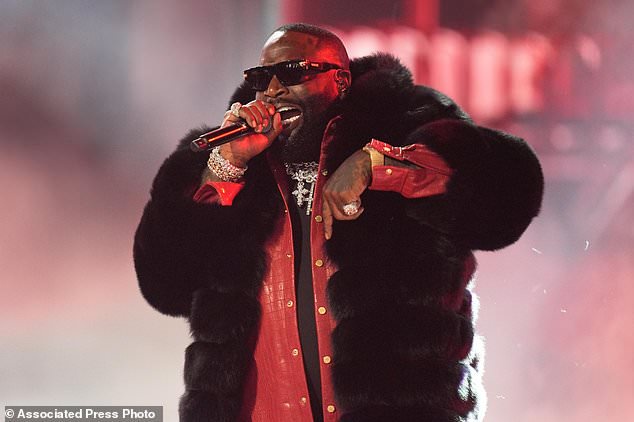 Rapper Rick Ross stands charged with battery after a woman alleges domestic violence