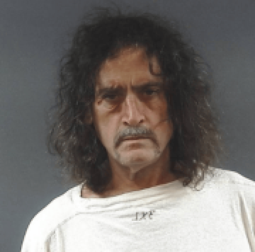 Police say man attempted to escape, fight police during warrant arrest