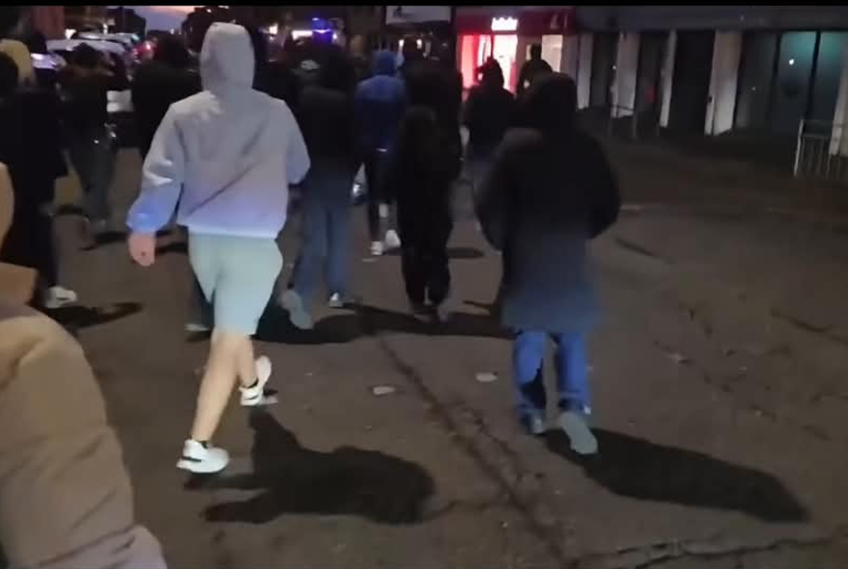 Masked mob chant ‘our streets’ and walk through traffic in Glasgow protest