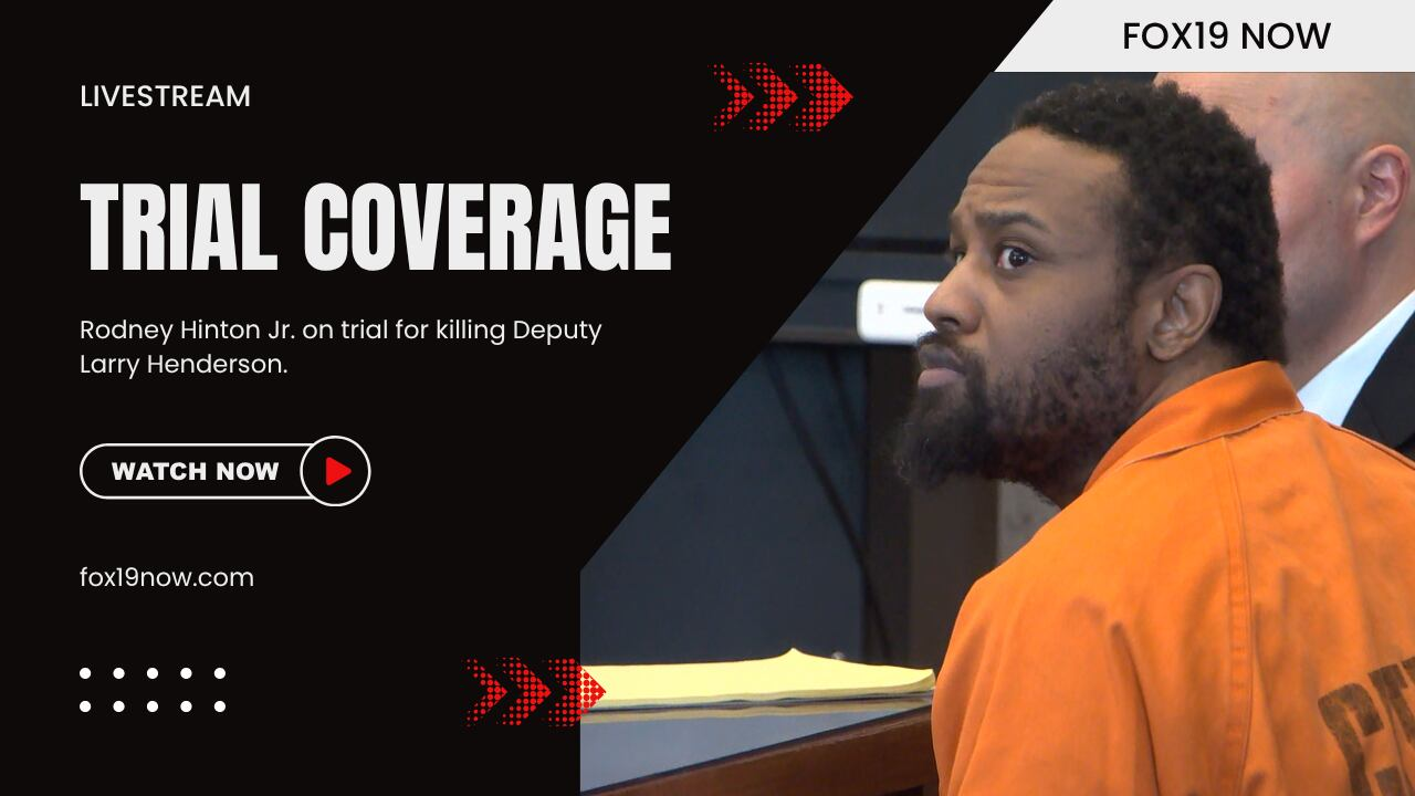Rodney Hinton Jr. smiles and winks in court as his trial begins in the killing of Deputy Larry Henderson