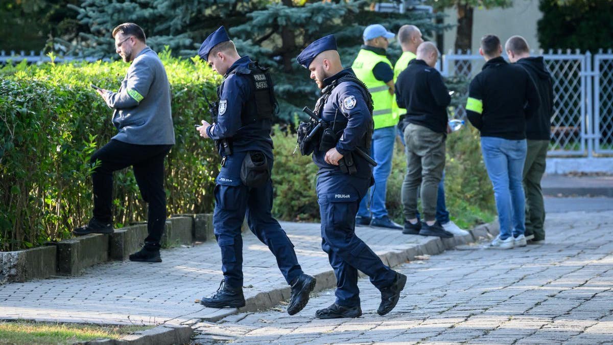 Teen wearing helmet camera kills worker at Polish school amid fears of copycat attacks