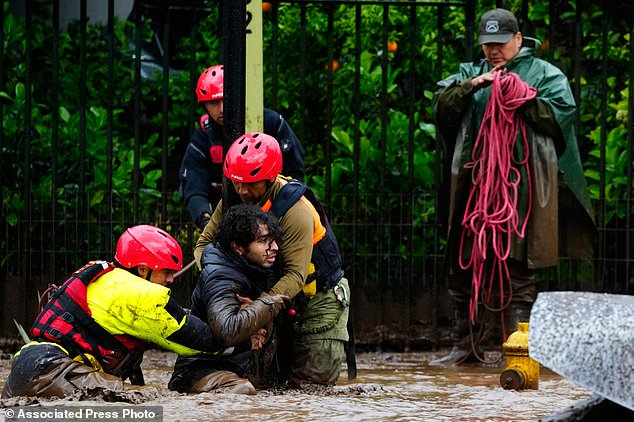 Heavy rain batters Chile´s capital, sweeping away cars and flooding homes