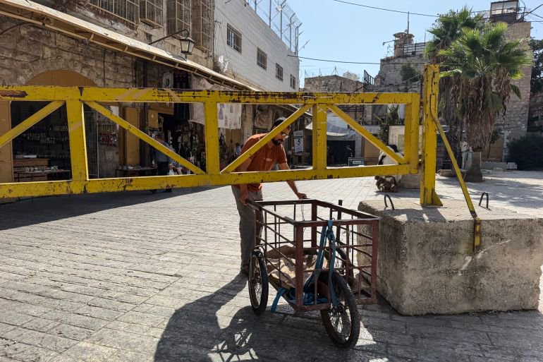Creating a ghost town: Lives in limbo behind Israeli gates and checkpoints