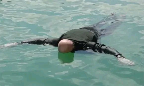 Why Dead Bodies May Float While Living Bodies Can Sink