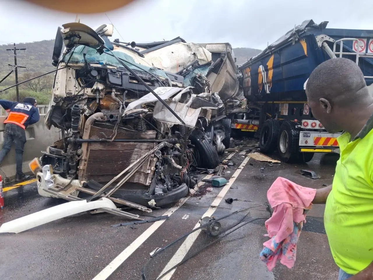 Three trucks involved in head-on collision on R511 at Pienaarsrivier Bridge, diesel spills onto road