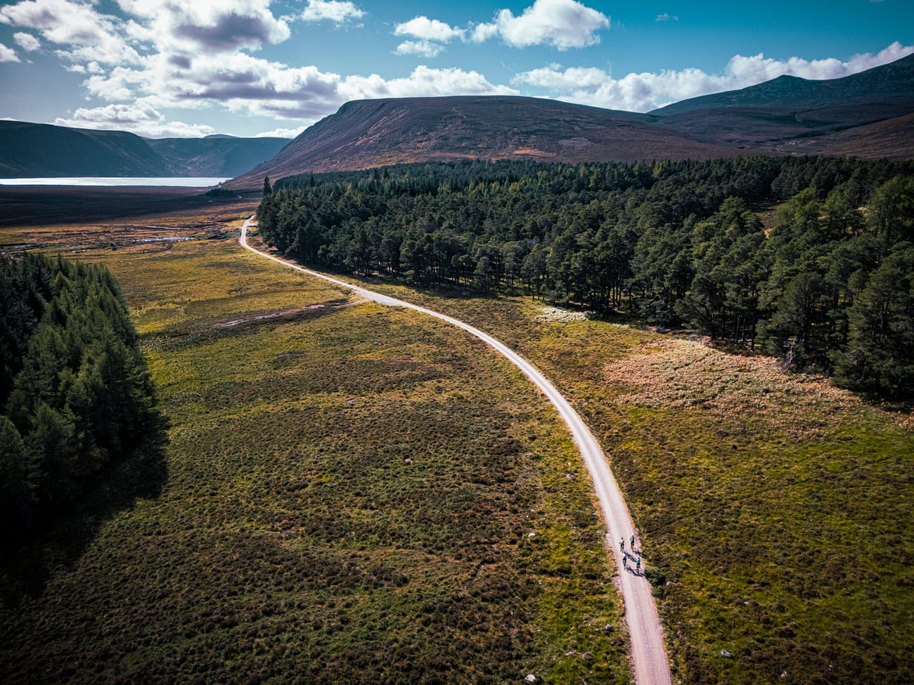 ‘It’s hard to imagine the fires of July’: a bike ride through the Cairngorms in Scotland