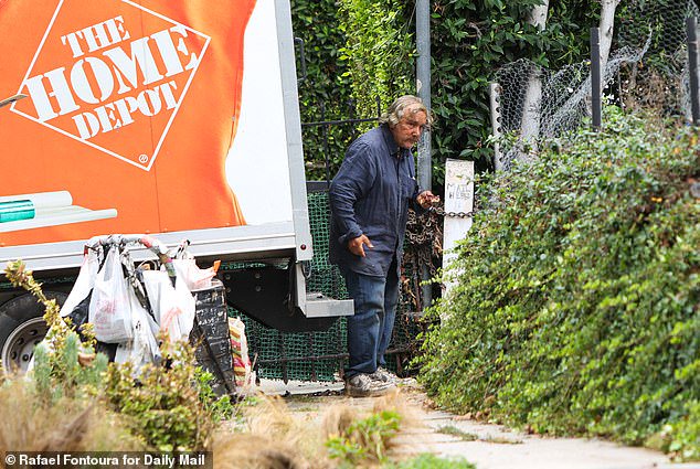 Friends reveal tragic truth about ‘America’s worst neighbor’ and fears about mountains of trash blighting his $1.3m home in ritzy LA neighborhood