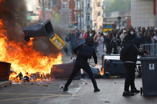 Boy, 15, has hand blown off by stun grenade during France school protests