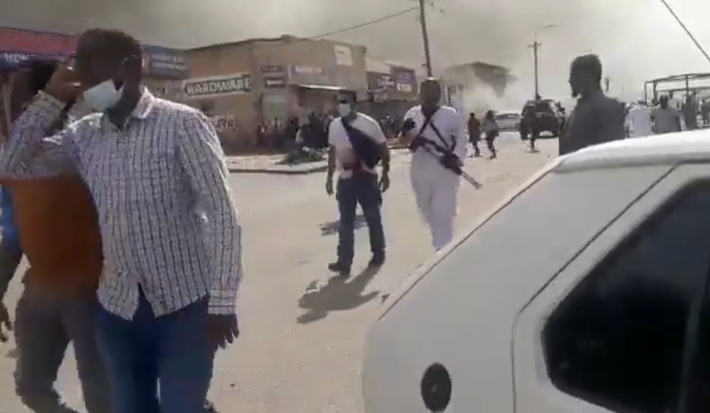 Footage shows a man carrying a military style rifle openly on a South African street