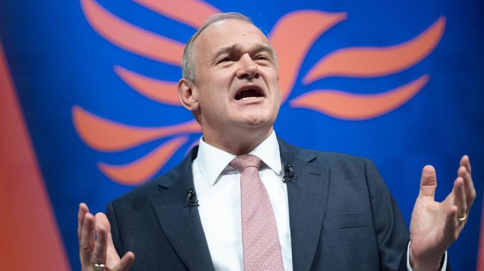 Lib Dems rally behind Davey as he pledges change