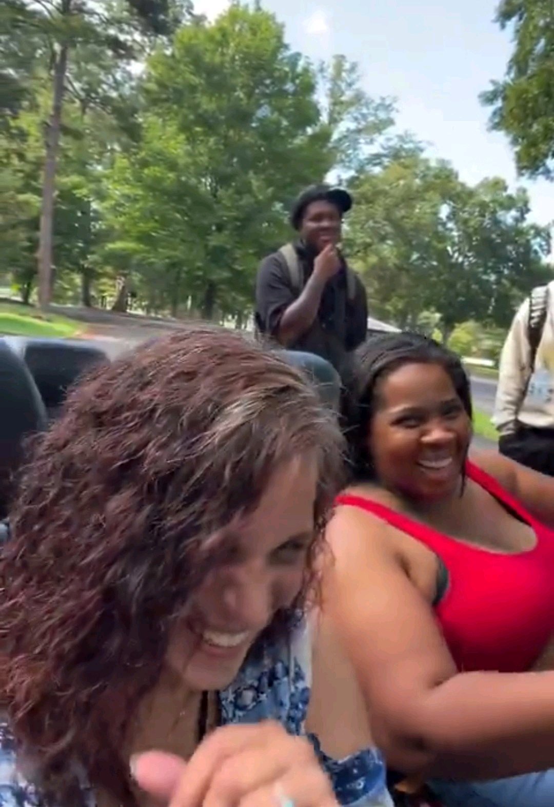 Older Women Filmed Getting Into Convertible With Two Young Men, Sparking Social Media Reactions