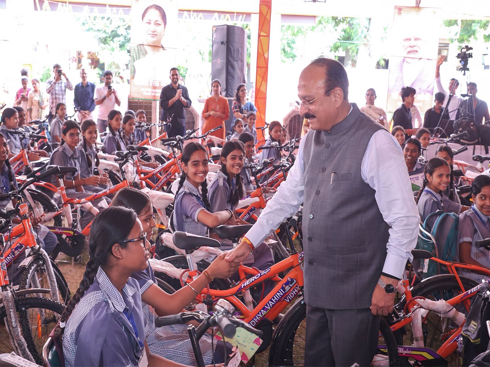 Delhi Education Minister Ashish Sood distributes bicycles to girl students under ‘Vidya Vahini Yojana’