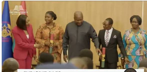 “Move to my right” – Mahama repositions Jean during photo session after swearing in two EC deputies