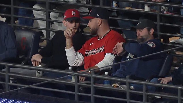 Travis Kelce makes surprise appearance at Cleveland Guardians’ crucial MLB playoff clash after buying stake in team… but there’s no sign of wife Taylor Swift