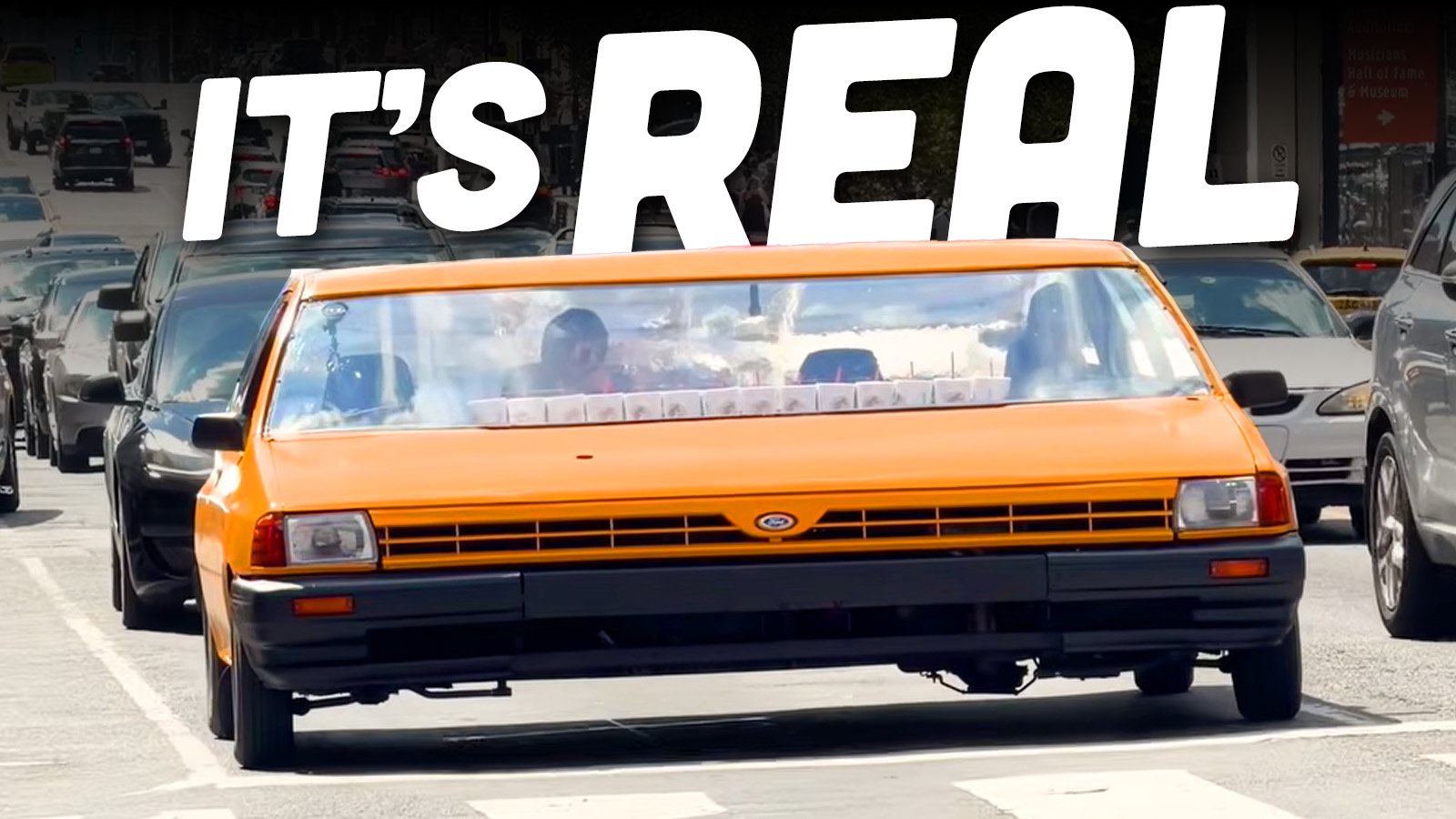 The World’s Biggest Ford Festiva Is 10 Feet Wide, Has 14 Cupholders, And Requires An Oversize Permit