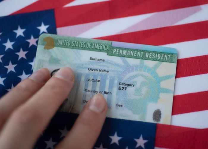 Lawsuit challenges new US green card policies over adjustment of status