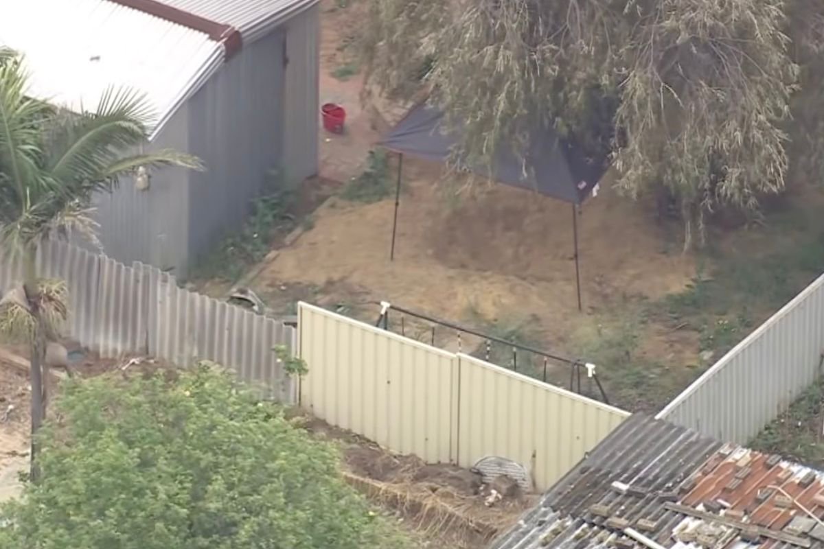 Twin brother charged with murder after sibling’s body found in backyard