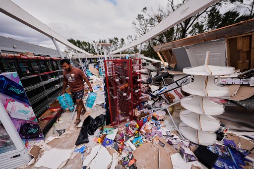 Isaias leaves trail of damage as it moves inland, in photos