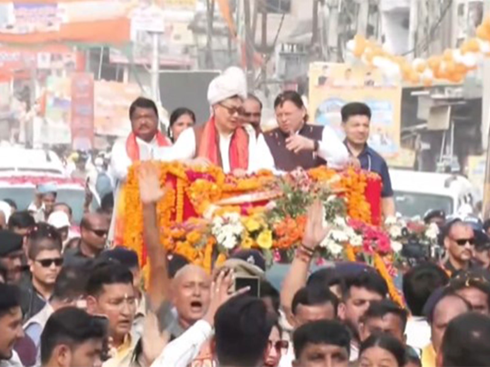 Uttarakhand CM Dhami, Union Ministers Kiren Rijiju and Jual Oram lead massive roadshow, attend ‘Aadi Rangotsav Festival’ in Khatima