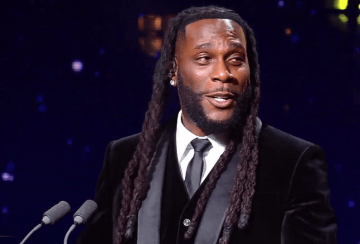Burna Boy presents Sócrates Award to Bukayo Saka at Ballon d’Or