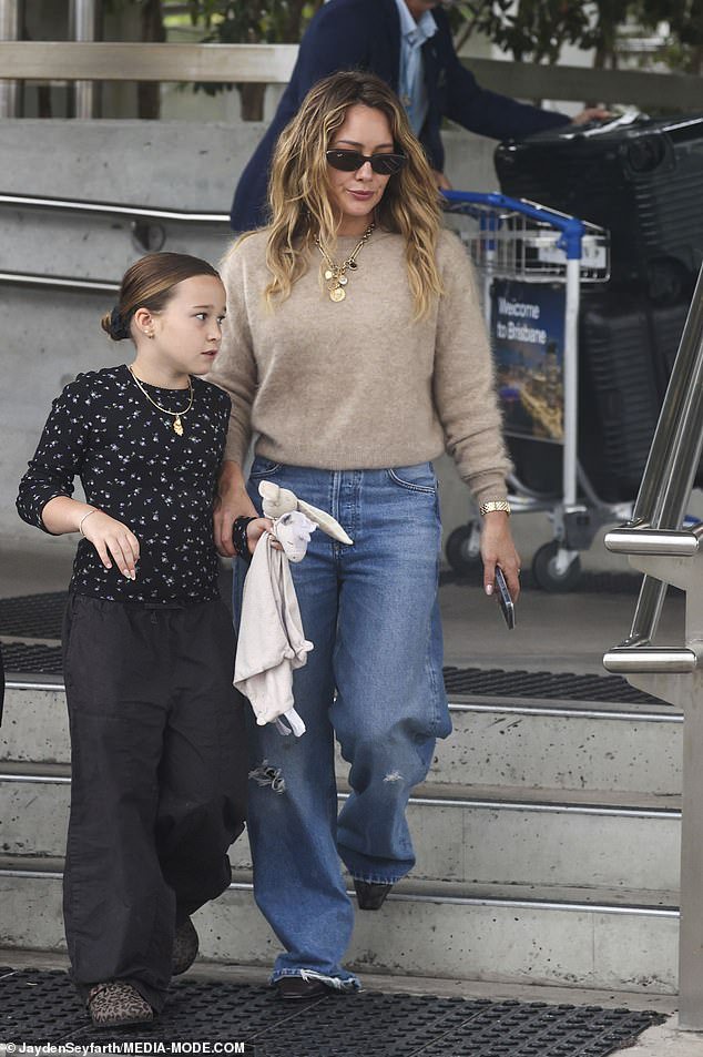 Hilary Duff arrives Down Under: US pop star touches down in Brisbane with her mini-me daughter ahead of her highly anticipated Australian comeback tour