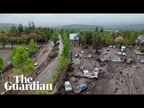 Heavy rain hits Chile’s capital damaging vehicles and homes – video