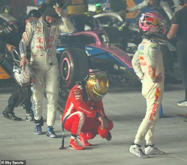 Lewis Hamilton is taken to Singapore Grand Prix medical centre post-race after feeling unwell and pictured crouching over – with Ferrari driver skipping media duties as a result