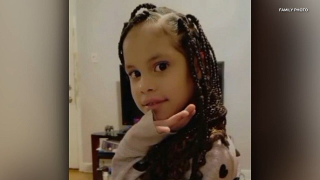 Seven-year-old girl stabbed to death on sidewalk by stranger as video shows horrified bystanders racing to detain woman