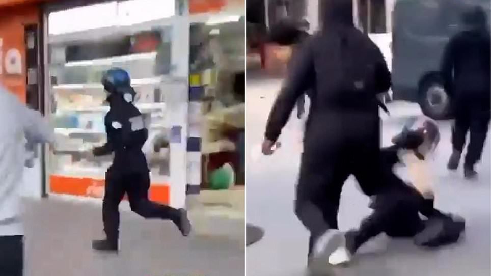 Policewoman chased down street, kicked to ground as riots rock France