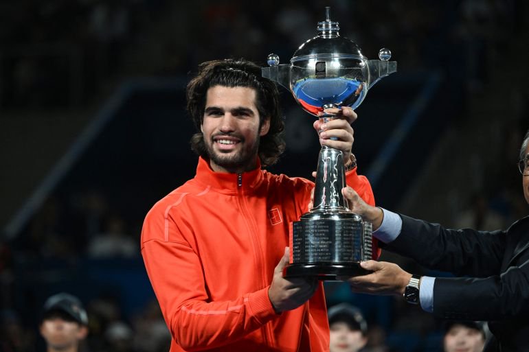 Djokovic wins China Open after de Minaur retires, Alcaraz wins Japan Open