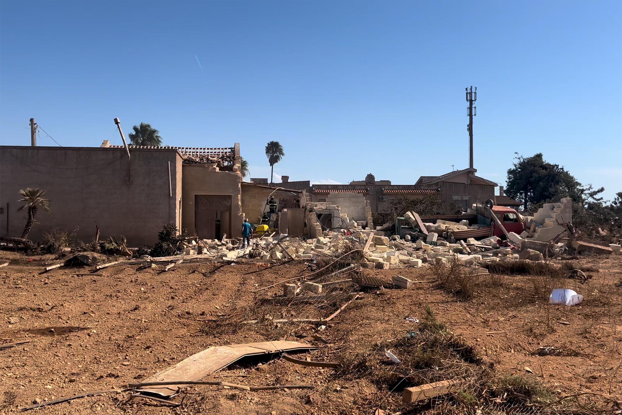 Wild video shows tornado rip through Sicilian city, injuring 11, destroying a school, flipping cars