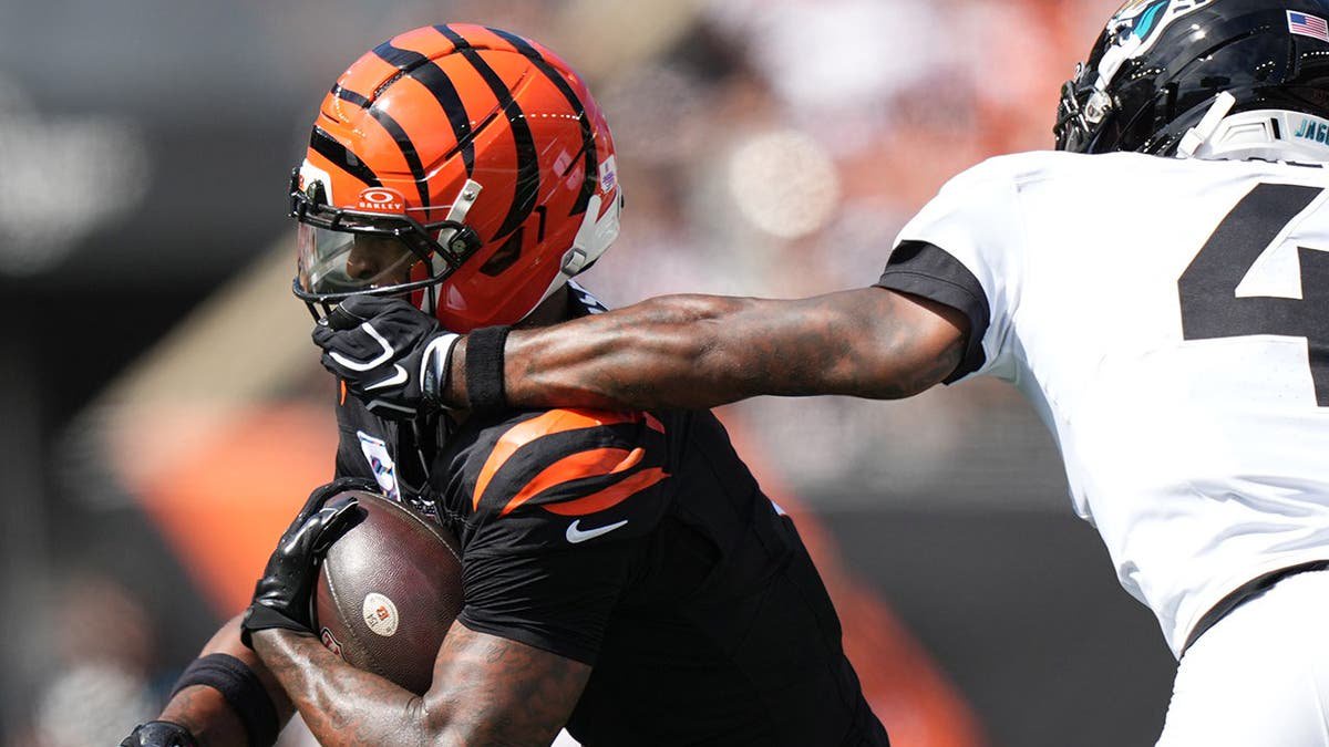 Bengals’ Ja’Marr Chase suffers concussion after getting his facemask pulled and taking huge hit