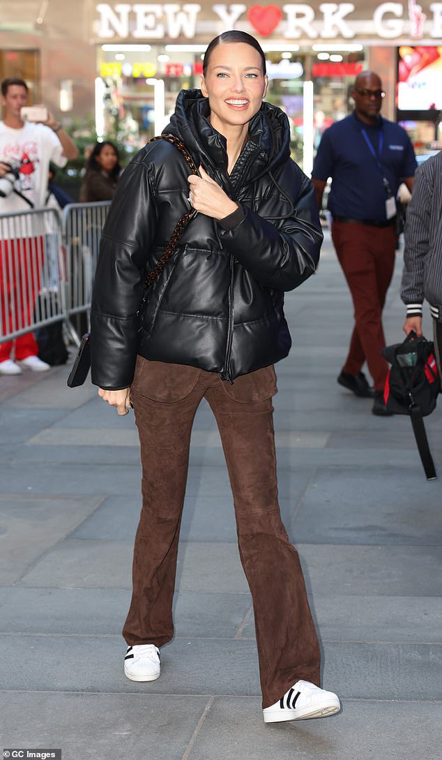 Adriana Lima, 45, covers up thinner-than-ever frame as she steps out after sparking fears with weight loss