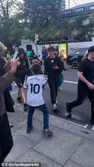 Chelsea star Cole Palmer under fire as he ‘can’t even be bothered to say hello’ to desperate young fans swarming him and his girlfriend as they walk home