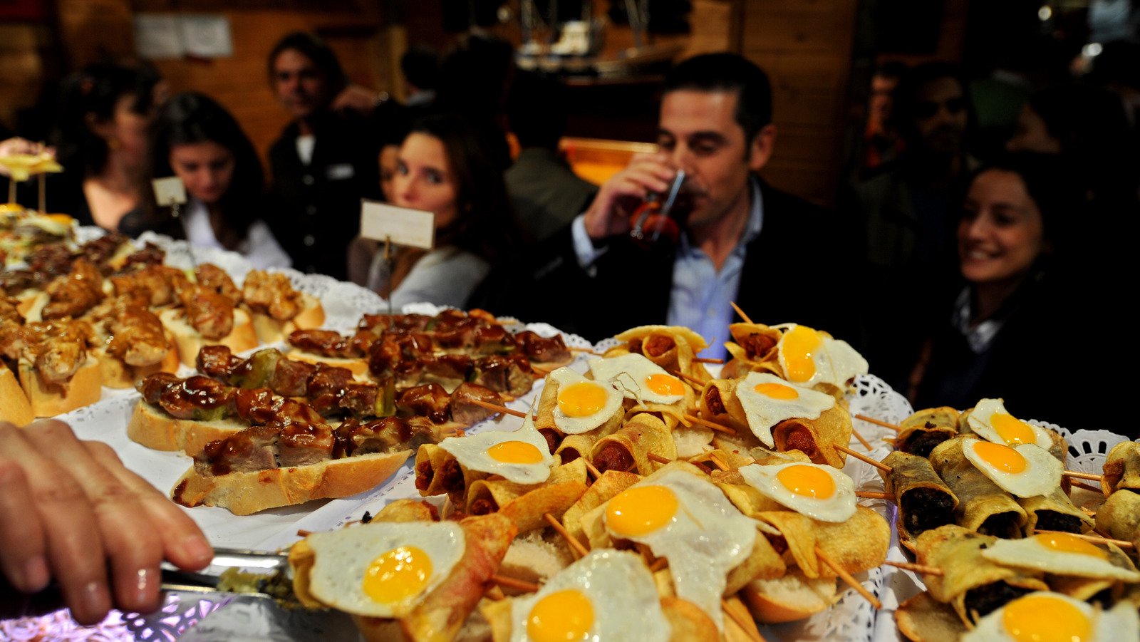 Why Tourists Should ‘Go Mobile’ For Dinner While In The City Of Madrid, Per Rick Steves