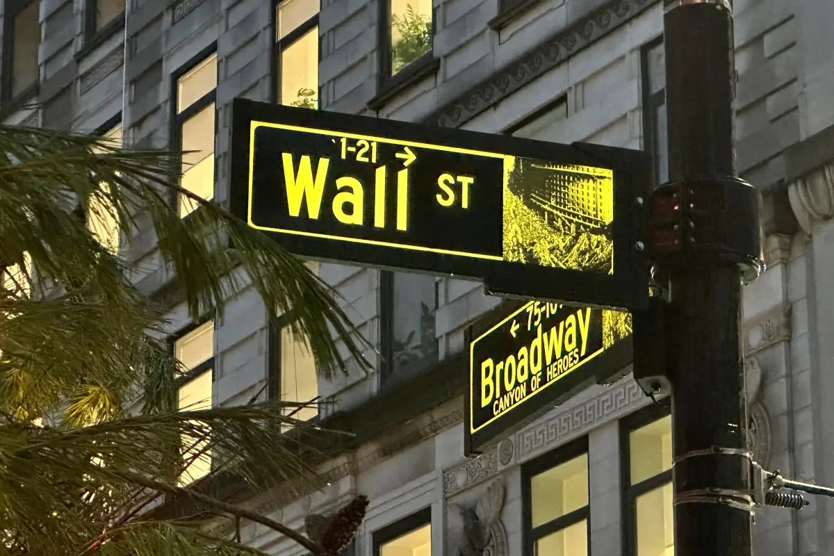 Stocks rise near their record after the latest jobs report eases worries about inflation