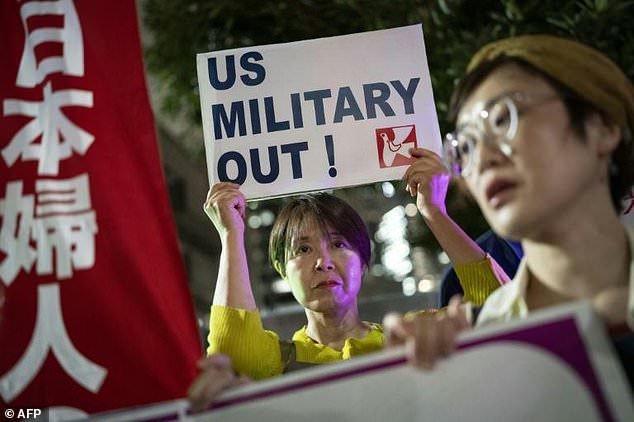‘Everyone is angry’: Okinawans fearful and frustrated after killing