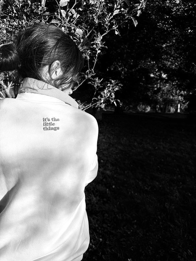 Meghan, is that you? Charity teases Duchess of Sussex as their new model and she poses with her back to the camera wearing a special-edition sweatshirt