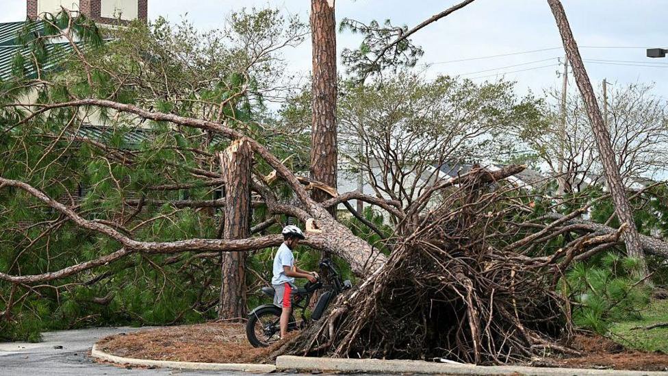 Four dead and thousands without power after Hurricane Isaias lashes US
