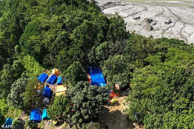 ‘Tough to stay here’: Nepal flood survivors wait for homes