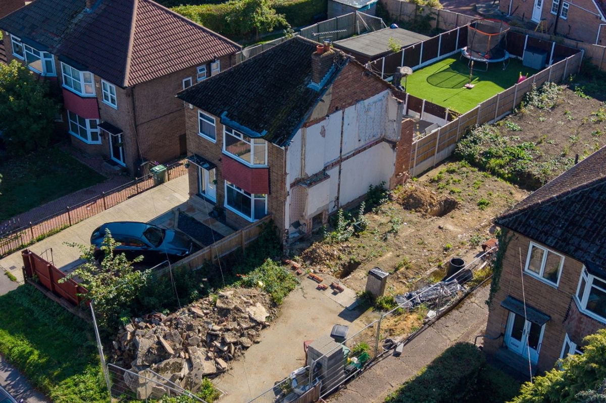 Leeds dad who demolished half a semi-detached house before moving abroad insists it was ‘necessary’