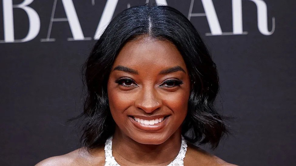 Simone Biles shows off fit physique in leather mini-skirt in photos from London getaway