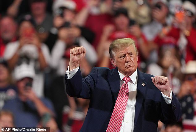 Trump pours $100 million in eleventh-hour scramble to try and save the doomed Republican majority after internal fury