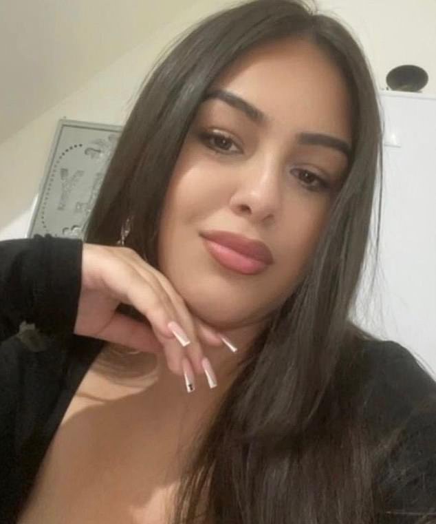 Newborn baby girl whose dead body was found on top of washing machine is named as inquest hears of 33 wounds from 15 stabbings while mother faces murder trial