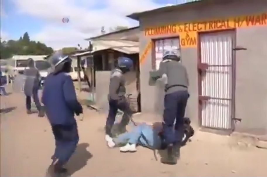 Zimbabwean police filmed beating people as the clip fuels migration debate