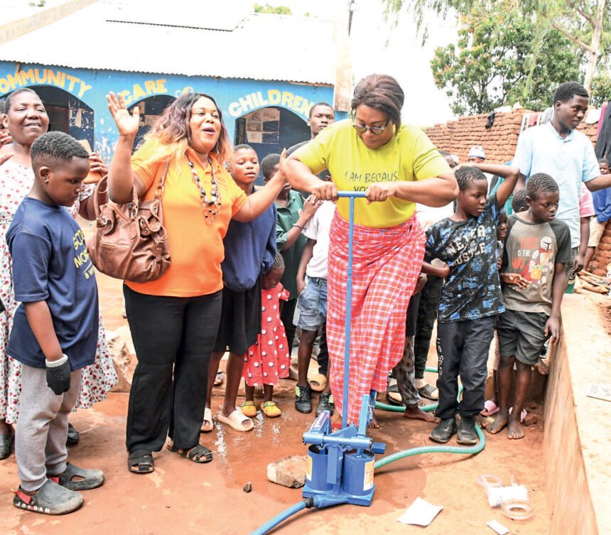 Treadle pump helps children in need grow food and hope