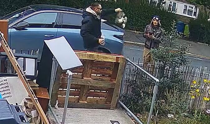 Horror moment laughing thug yanks pet rabbit from garden by his ears