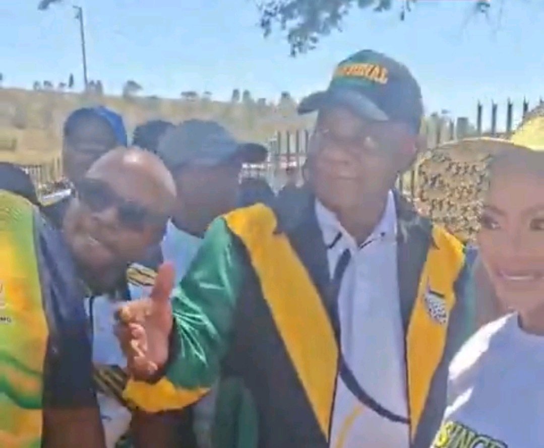 Ramaphosa pays for a homemade jersey from a briefcase during campaigning