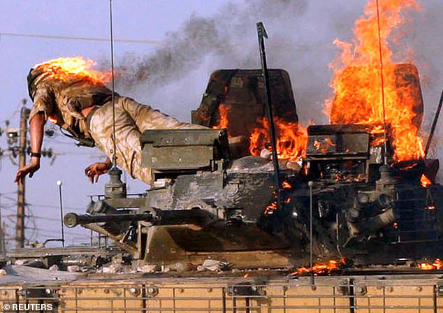 From Saddam’s execution to the rise and fall of ISIS: Stunning images illustrate America’s two decades in Iraq as final US troops leave today