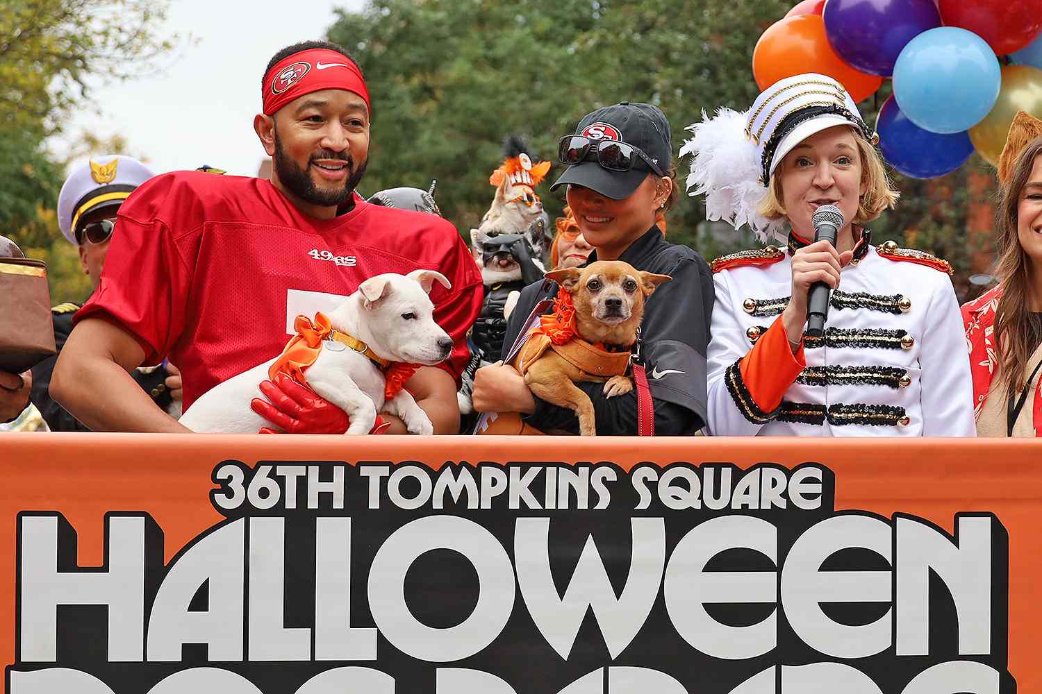 Chrissy Teigen and John Legend Lead Hundreds of Costumed Canines for N.Y.C.’s Famous Halloween Dog Parade